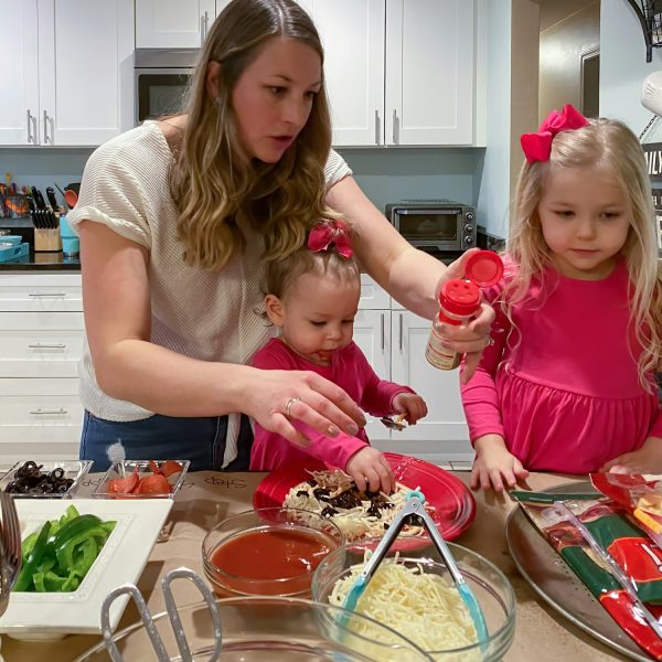 busy-family-making-dinner-together-in-the-kitchen.jpg